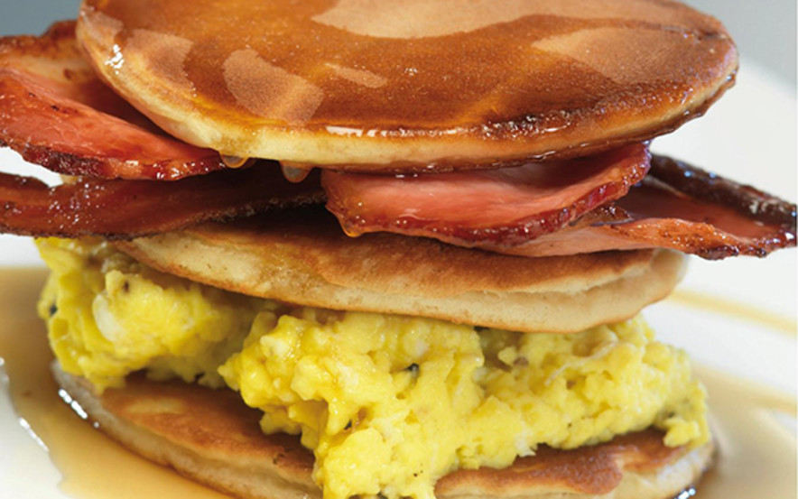 Pancakes, Scrambled Eggs, Crispy Bacon and Maple Syrup